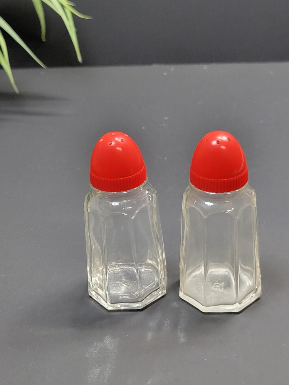 Vintage Salt and Pepper Shakers Clear Glass Plastic Red Cover Hazel Atlas MCM